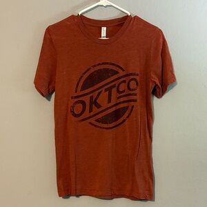 OK Tease Co in Rust OKT co logo